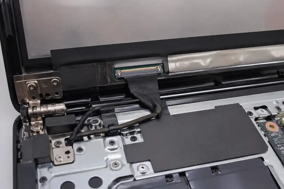 30-pin eDP path inside a compact laptop display hinge area