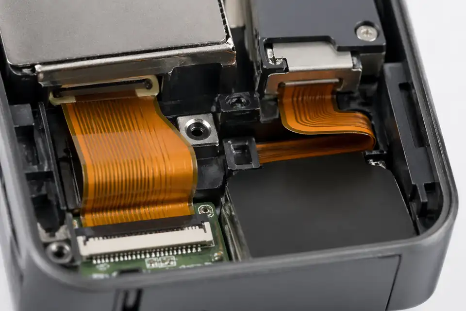 Folded-routing FFC and FPC assembly inside compact consumer electronics