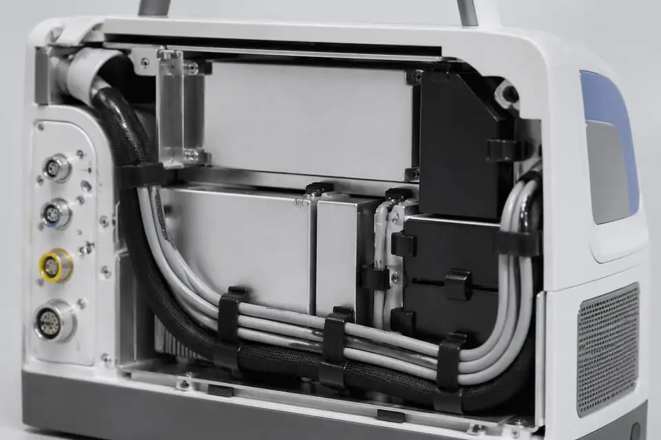 Portable-medical cable assembly inside a transport-ready medical electronics module